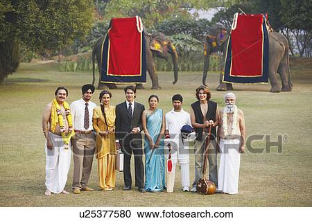 Stock Image - Group of people standing in the garden. Fotosearch