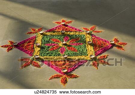 Stock Photography - High angle view of a rangoli on the floor. Fotosearch