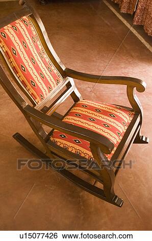 Stock Photograph - High angle view of a rocking chair in a room. Fotosearch