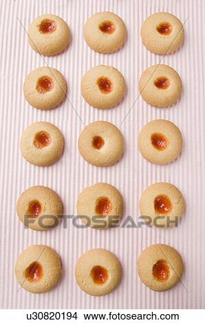 High angle view of biscuits in a row View Large Photo Image Picture - High angle view of biscuits in a row. Fotosearch