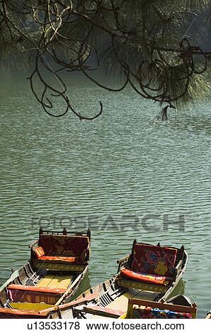 Stock Photo - High angle view of boats in a lake. Fotosearch