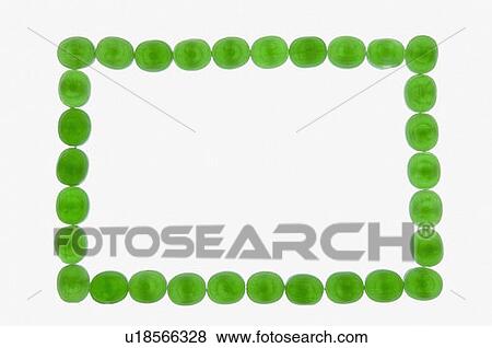 High angle view of green candies arranged in the horizontal form View Large Photo Image Stock Photo - High angle view of green candies arranged in the horizontal form. Fotosearch