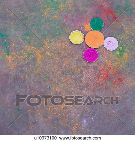 Stock Image - High angle view of plates of powder paint. Fotosearch