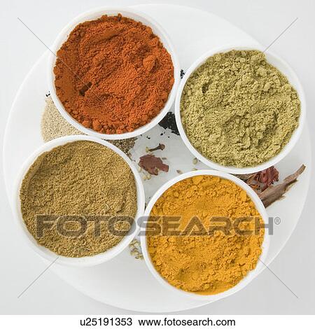 High angle view of spices in four bowls View Large Photo Image Stock Image - High angle view of spices in four bowls. Fotosearch