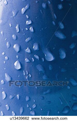 High angle view of water droplets on a blue surface View Large Photo Image Stock Image - High angle view of water droplets on a blue surface. Fotosearch