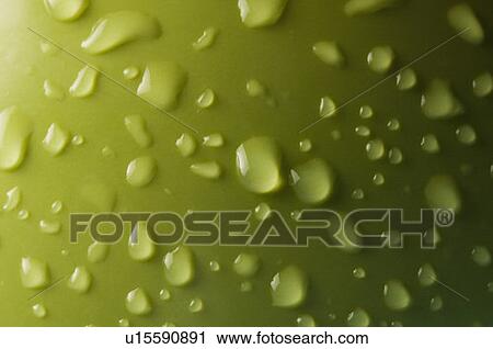High angle view of water droplets on a green surface View Large Photo Image Stock Image - High angle view of water droplets on a green surface. Fotosearch