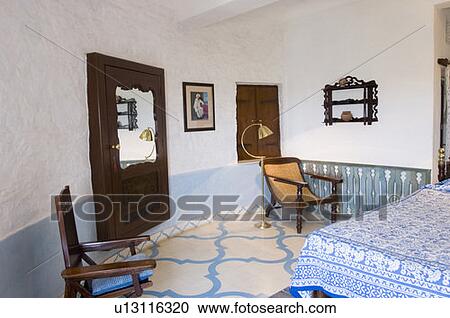Stock Image - Interiors of a bedroom. Fotosearch