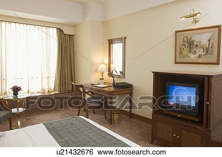 Interiors of a bedroom View Large Photo Image Stock Photograph - Interiors of a bedroom. Fotosearch