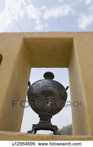 Stock Photography - Low angle view of a decorative urn. Fotosearch