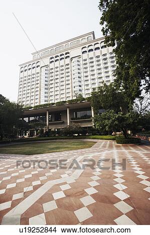 Low angle view of a multi-storied building View Large Photo Image Picture - Low angle view of a multi-storied building. Fotosearch