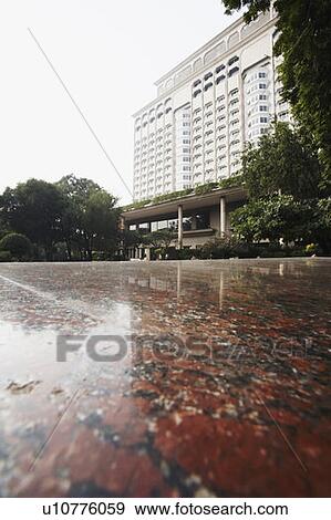 Stock Photo - Low angle view of a multi-storied building. Fotosearch