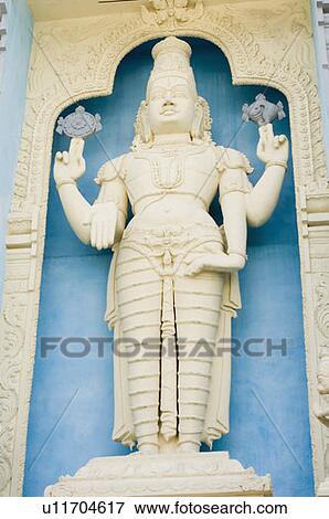 Stock Photo - Low angle view of a statue of lord Vishnu, Tirupati, Tirumala Venkateswara Temple, Tirumala, Andhra Pradesh, India. Fotosearch