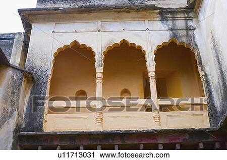 Stock Image - Low angle view of balcony of a palace, Neemrana Fort Palace, Neemrana, Alwar, Rajasthan, India. Fotosearch