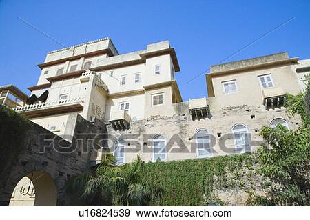 Low angle view of houses View Large Photo Image Stock Photo - Low angle view of houses. Fotosearch