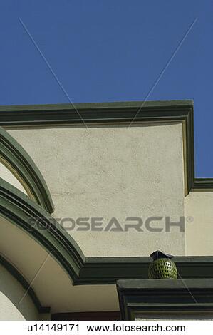 Low angle view of the top of a building View Large Photo Image Stock Image - Low angle view of the top of a building. Fotosearch