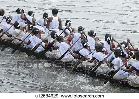 Men and women rowing a snakeboat View Large Photo Image Stock Photo - Men and women rowing a snakeboat. Fotosearch
