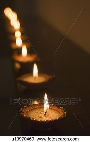 Stock Photo - Oil lamps in a row. Fotosearch