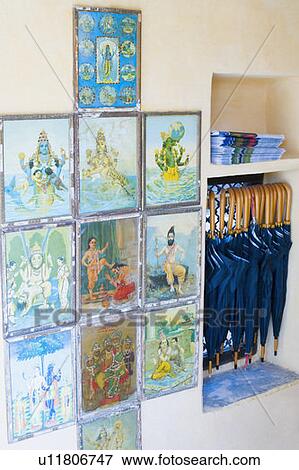 Stock Photo - Paintings mounted on a wall. Fotosearch
