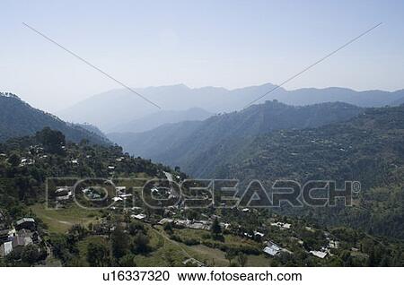 Panoramic view of a mountain range View Large Photo Image Stock Image - Panoramic view of a mountain range. Fotosearch