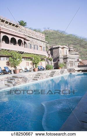 Stock Photo - Pool in front of a fort, Neemrana Fort Palace, Neemrana, Alwar, Rajasthan, India. Fotosearch