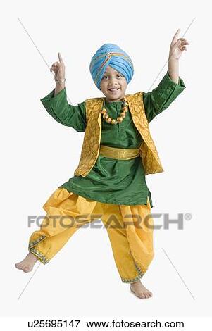 Stock Photo - Portrait of a boy doing bhangra. Fotosearch
