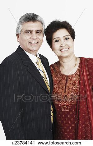 Stock Image - Portrait of a mature couple smiling. Fotosearch