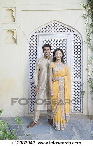 Portrait of a mid adult couple smiling View Large Photo Image Stock Image - Portrait of a mid adult couple smiling. Fotosearch