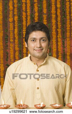 Stock Image - Portrait of a mid adult man smiling. Fotosearch