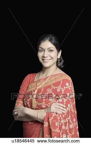 Stock Photography - Portrait of a mid adult woman smiling. Fotosearch