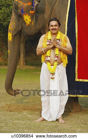 Picture - Portrait of a priest greeting. Fotosearch
