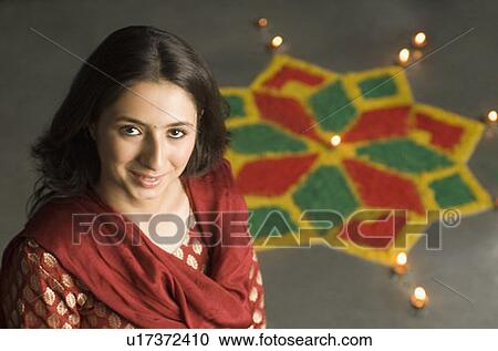 Portrait of a young woman smiling View Large Photo Image Stock Image - Portrait of a young woman smiling. Fotosearch
