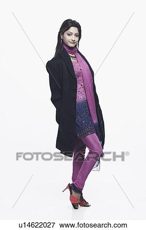 Portrait of a young woman smiling View Large Photo Image Stock Photo - Portrait of a young woman smiling. Fotosearch