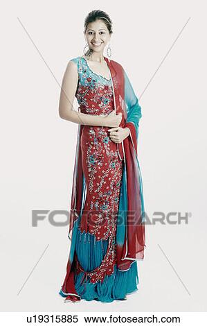 Stock Photography - Portrait of a young woman smiling. Fotosearch