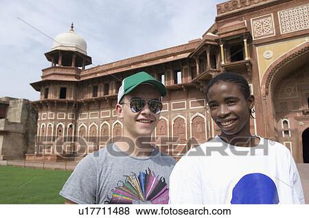 Portrait of two young men smiling, Taj Mahal, Agra, Uttar Pradesh, India View Large Photo Image Stock Photo - Portrait of two young men smiling, Taj Mahal, Agra, Uttar Pradesh, India. Fotosearch