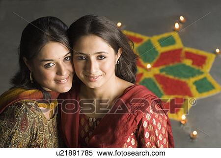 Stock Photography - Portrait of two young women smiling. Fotosearch