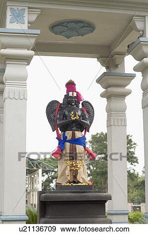 Stock Photo - Statue of a Garuda in a temple, Tirupati, Tirumala Venkateswara Temple, Tirumala, Andhra Pradesh, India. Fotosearch
