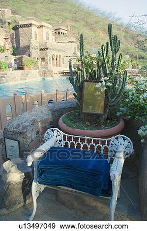 Towels in an armchair with a fort in the background, Neemrana Fort Palace, Neemrana, Alwar, Rajasthan, India View Large Photo Image Stock Photo - Towels in an armchair with a fort in the background, Neemrana Fort Palace, Neemrana, Alwar, Rajasthan, India. Fotosearch