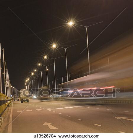 Truck on the highway at night, Delhi-Mumbai Highway, India View Large Photo Image Picture - Truck on the highway at night, Delhi-Mumbai Highway, India. Fotosearch