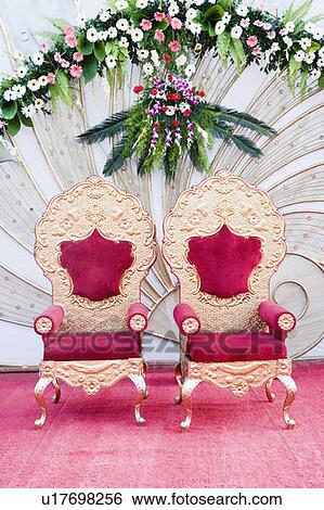 Stock Photograph - Two armchairs on a wedding stage. Fotosearch