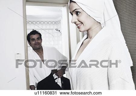 Young man looking at a young woman View Large Photo Image Stock Image - Young man looking at a young woman. Fotosearch