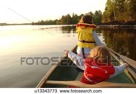 Stock Image - Canoe Trip - Lake of the Woods. Fotosearch