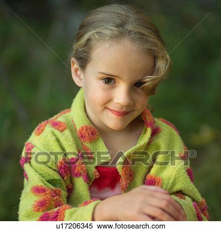 Stock Photography - 5 - 6 year old girl posing for camera. Fotosearch
