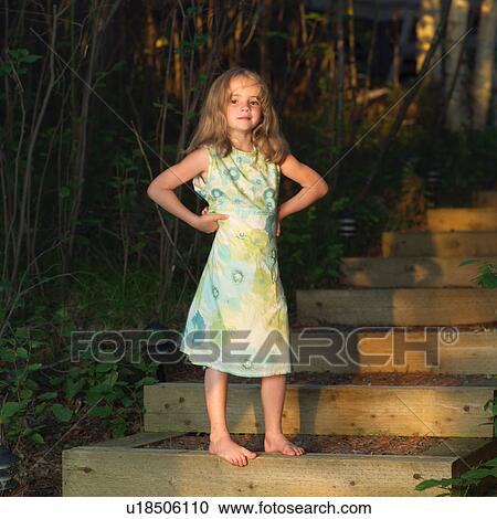 6 year old standing on steps View Large Photo Image Stock Image - 6 year old standing on steps. Fotosearch