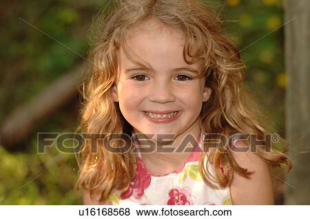 Blond child looking at the camera View Large Photo Image Stock Photo - Blond child looking at the camera. Fotosearch