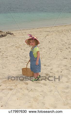 Child on beach View Large Photo Image Stock Image - Child on beach. Fotosearch