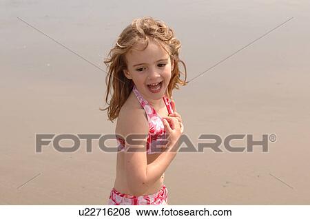 Young girl on beach, Pacific Rim National Park, Vancouver Island, Canada View Large Photo Image Stock Photo - Young girl on beach, Pacific Rim National Park, Vancouver Island, Canada. Fotosearch
