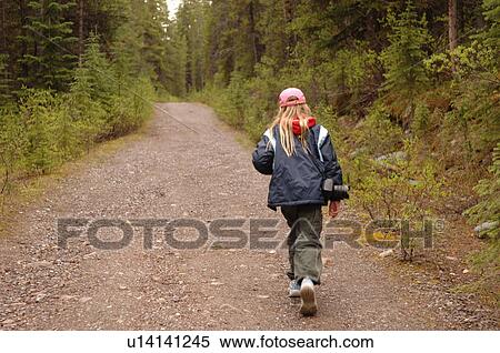 Stock Photography - Girl Walking on Bald Hills Trail, Jasper National Park, Canada. Fotosearch