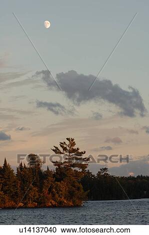 Stock Image - Lake of the Woods at twilight. Fotosearch