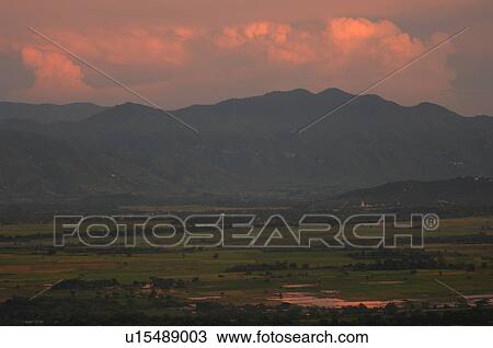 Stock Image - Mandalay landscape at dusk. Fotosearch