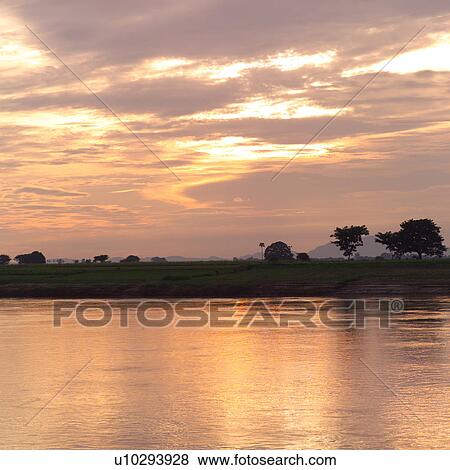 Stock Photo - Shoreline along Ayeyanwady River. Fotosearch